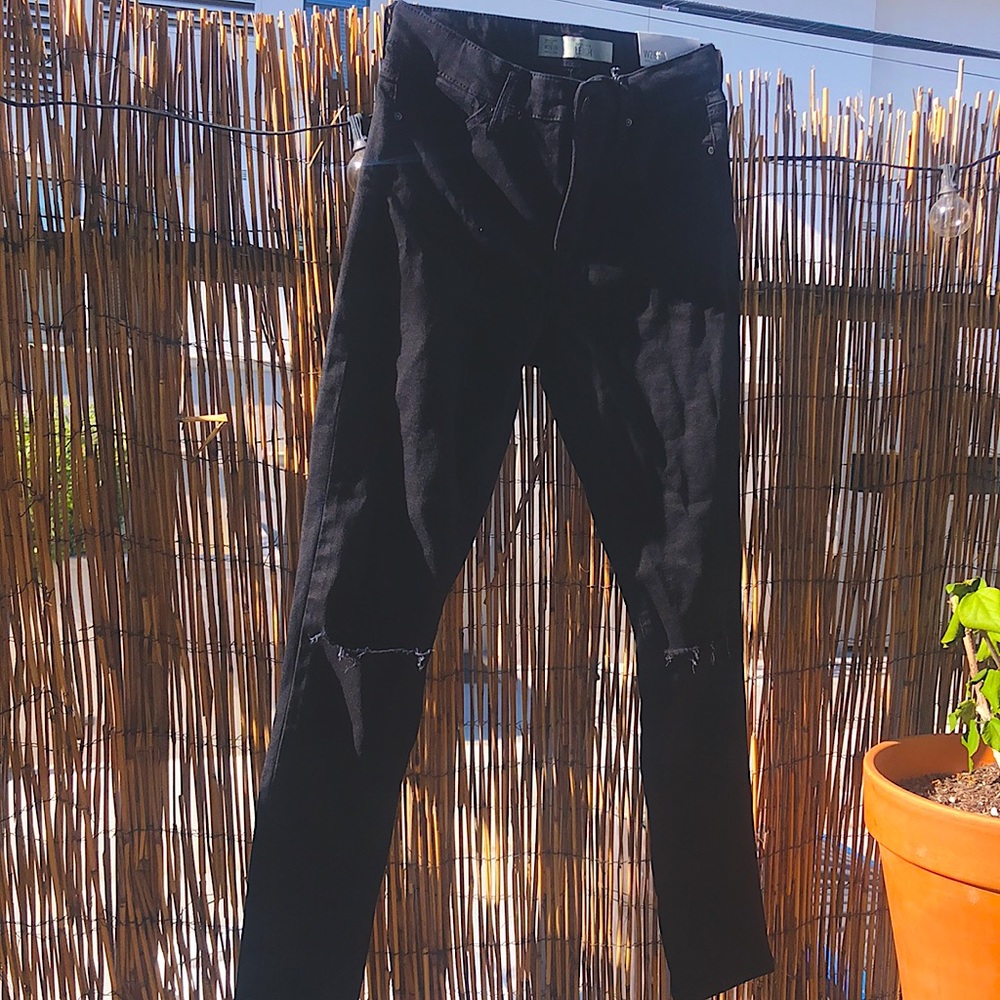 Black top shop jeans with hole in knees